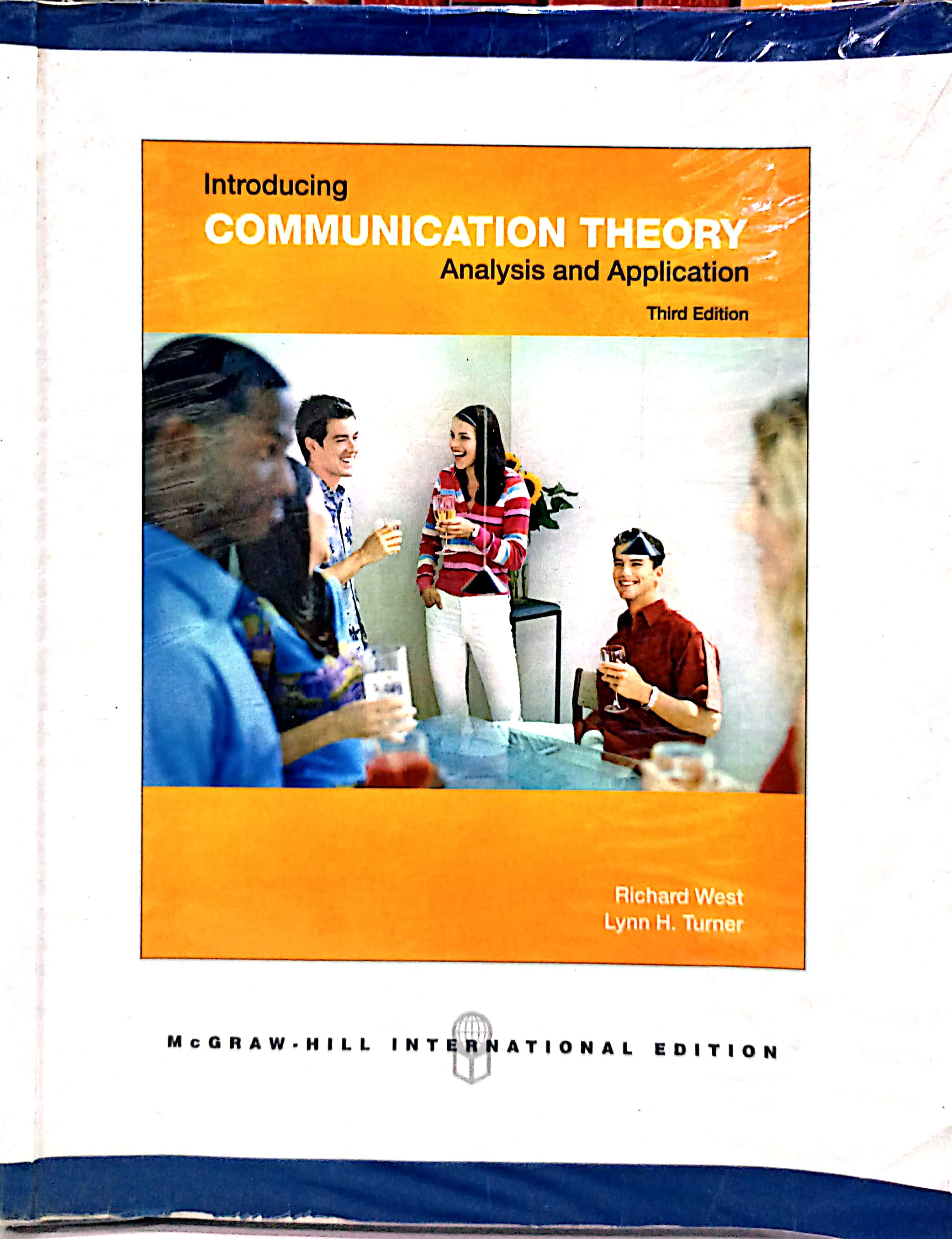 Book cover: Introducing communication theory : analysis and application