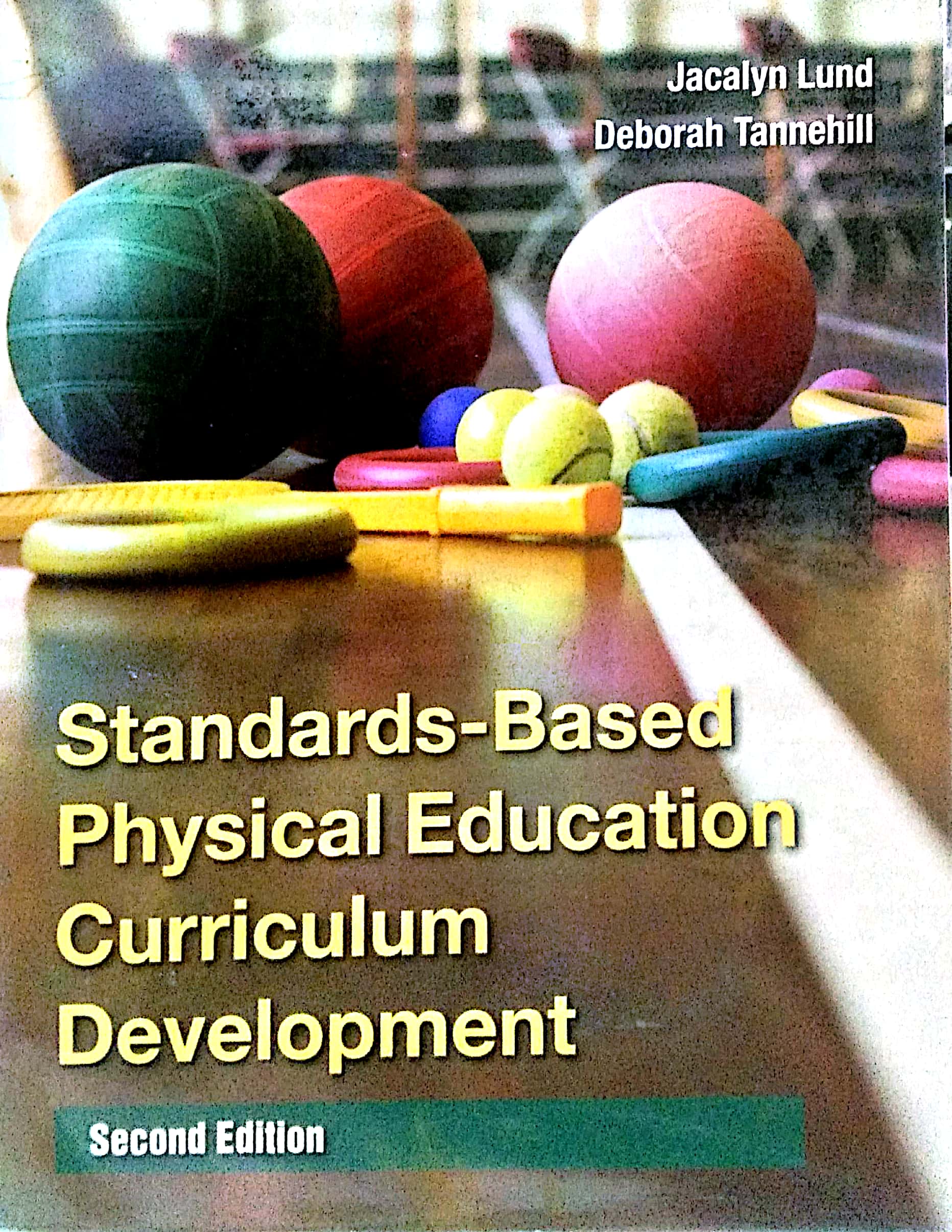Book cover: Standards-Based Physical Education Curriculum development.