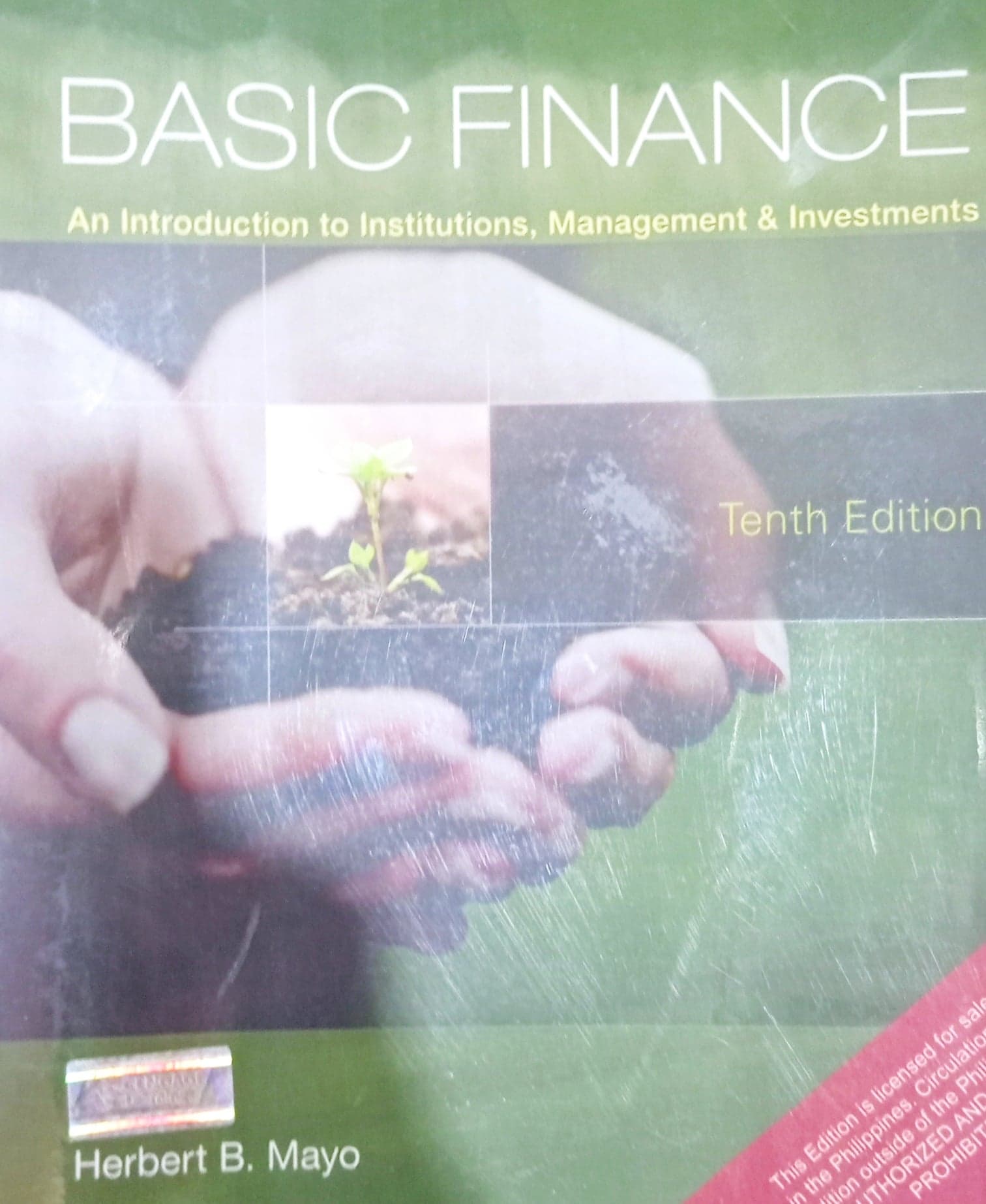Book cover: Basic finance : an introduction to institutions, management & investments